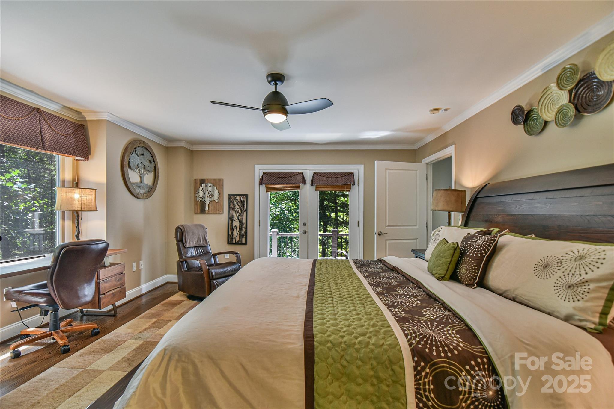 409 North Fork Road Black Mountain, NC 28711 - Photo 18 of 48 a bed room with a bed and a chair