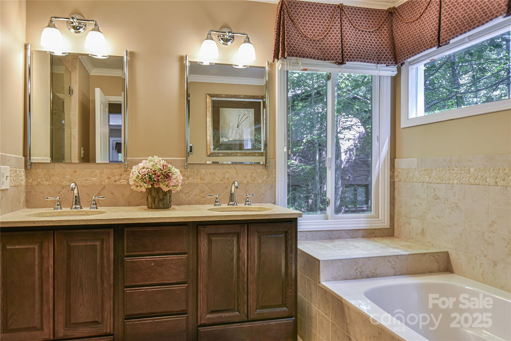 409 North Fork Road Black Mountain, NC 28711 - Photo 19 of 48 a bathroom with a sink and a bathtub