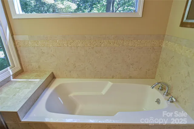a bathroom with a bathtub