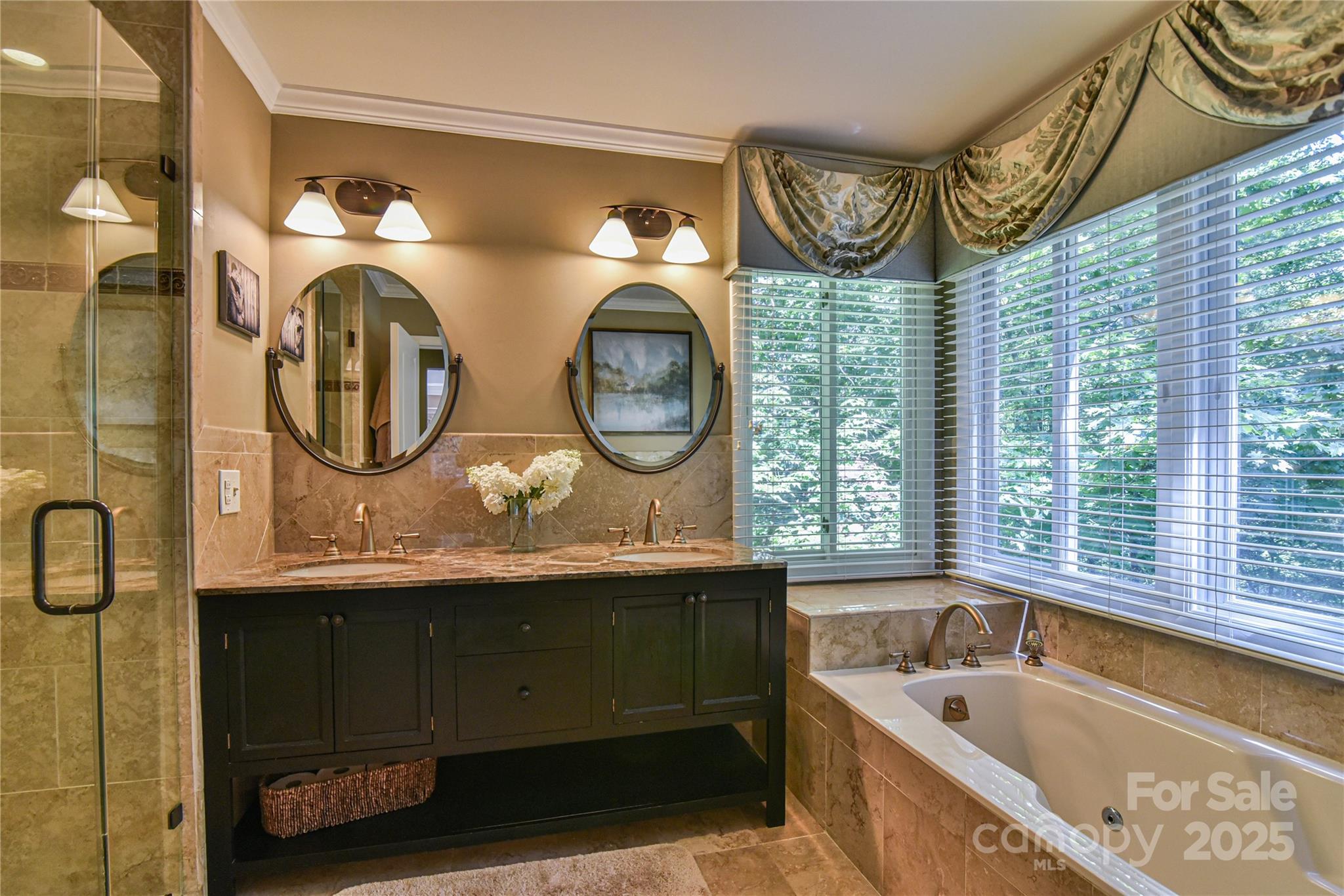 409 North Fork Road Black Mountain, NC 28711 - Photo 26 of 48 a bathroom with a sink and a mirror