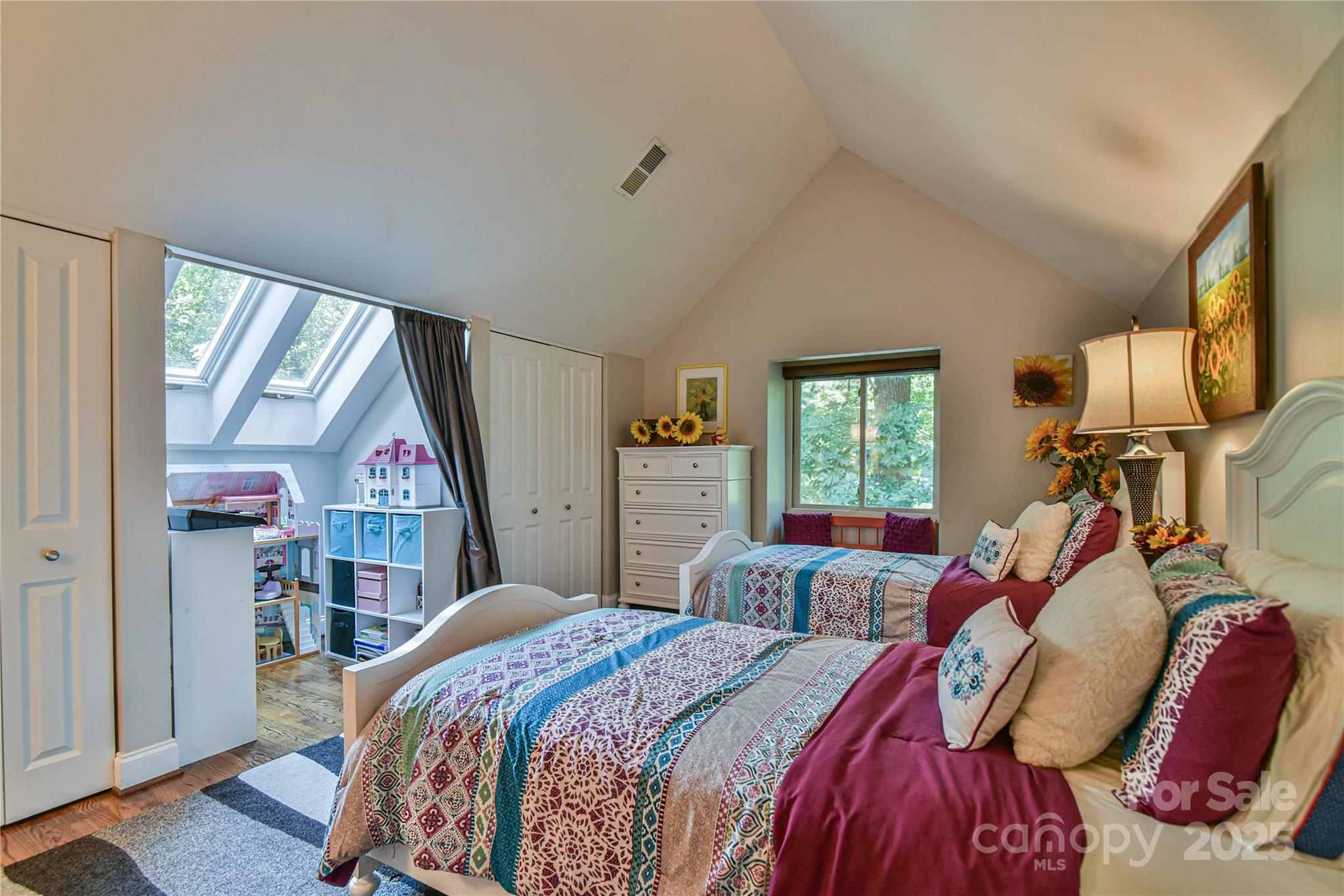 409 North Fork Road Black Mountain, NC 28711 - Photo 29 of 48 a bed room with a bed window and mirror