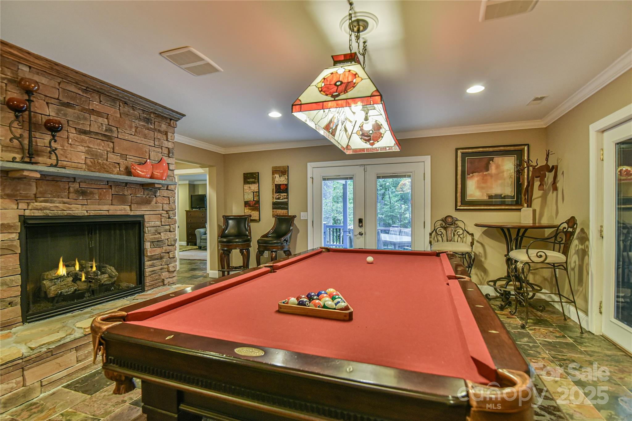 409 North Fork Road Black Mountain, NC 28711 - Photo 36 of 48 a room with pool table table and windows