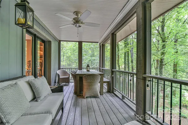 a view of a living room with a large window