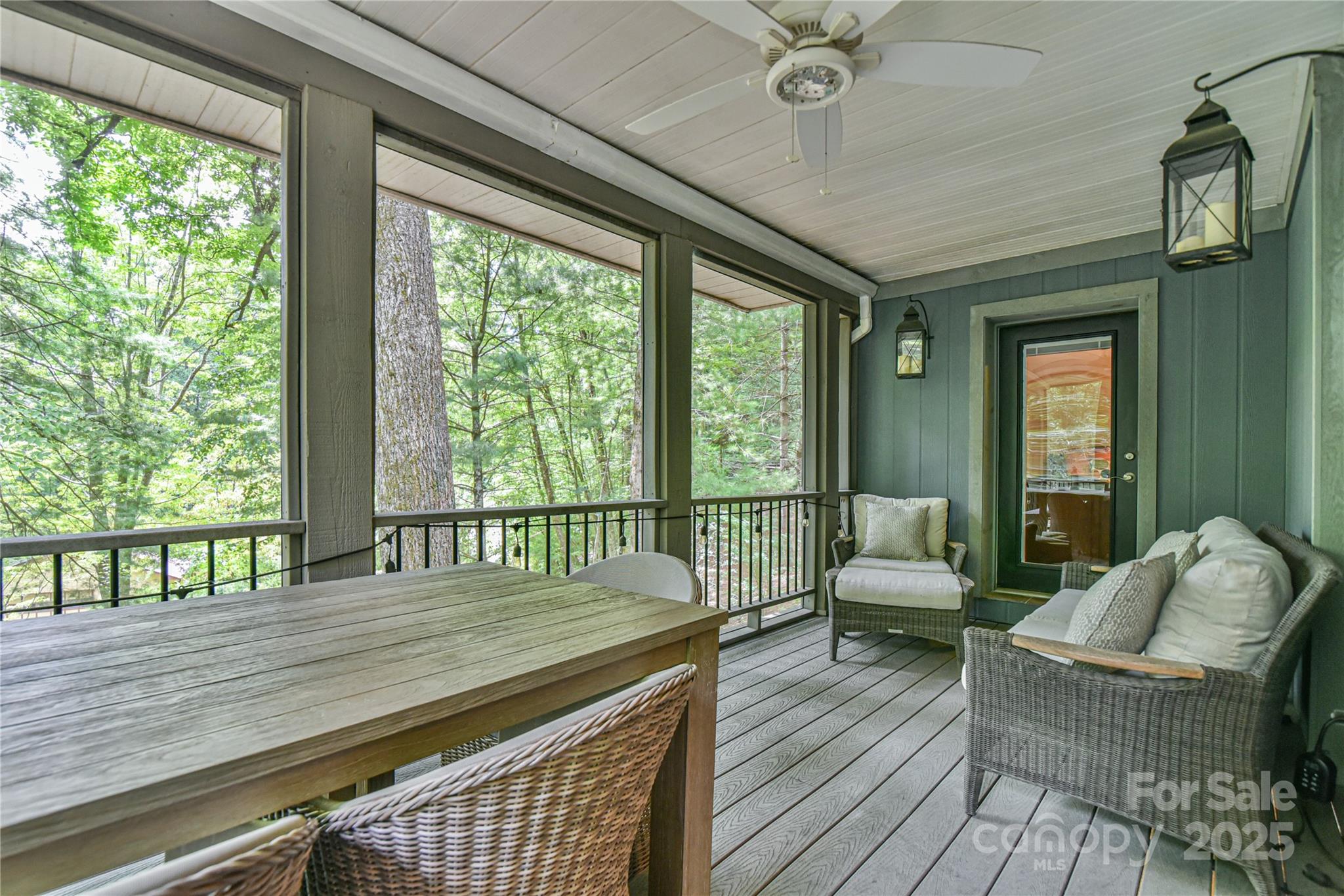 409 North Fork Road Black Mountain, NC 28711 - Photo 42 of 48 a living room with furniture and a floor to ceiling window