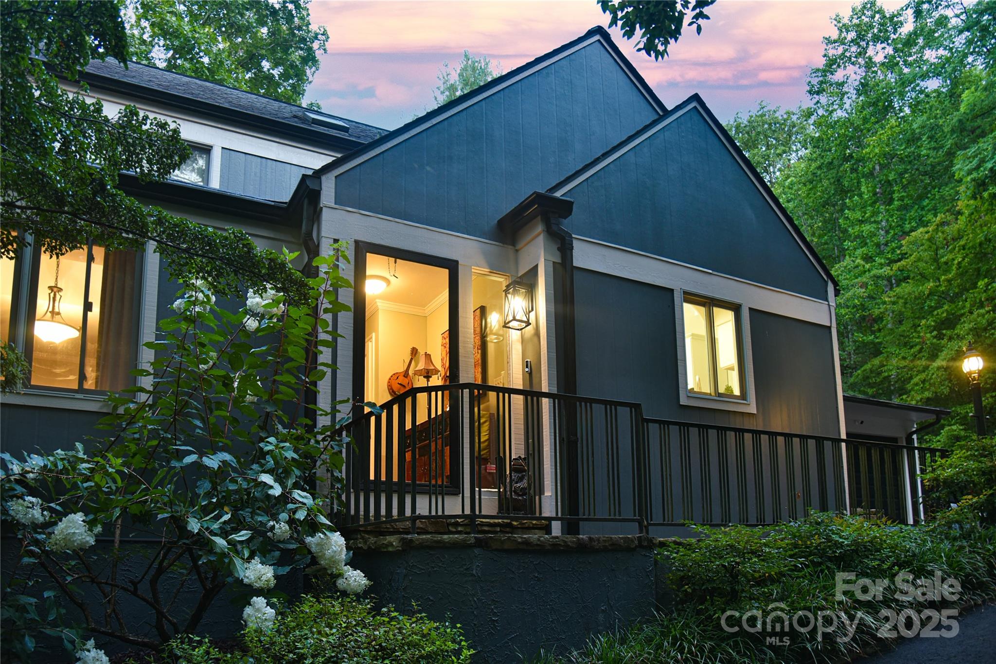 409 North Fork Road Black Mountain, NC 28711 - Photo 47 of 48 a house view with a garden space