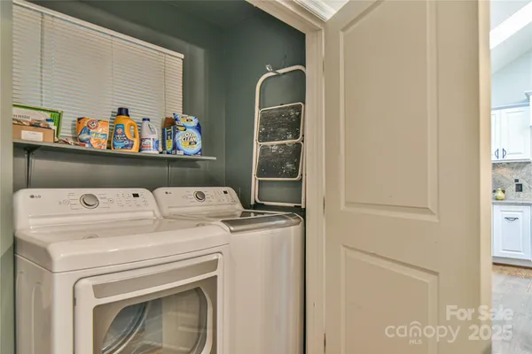 a utility room with dryer and washer