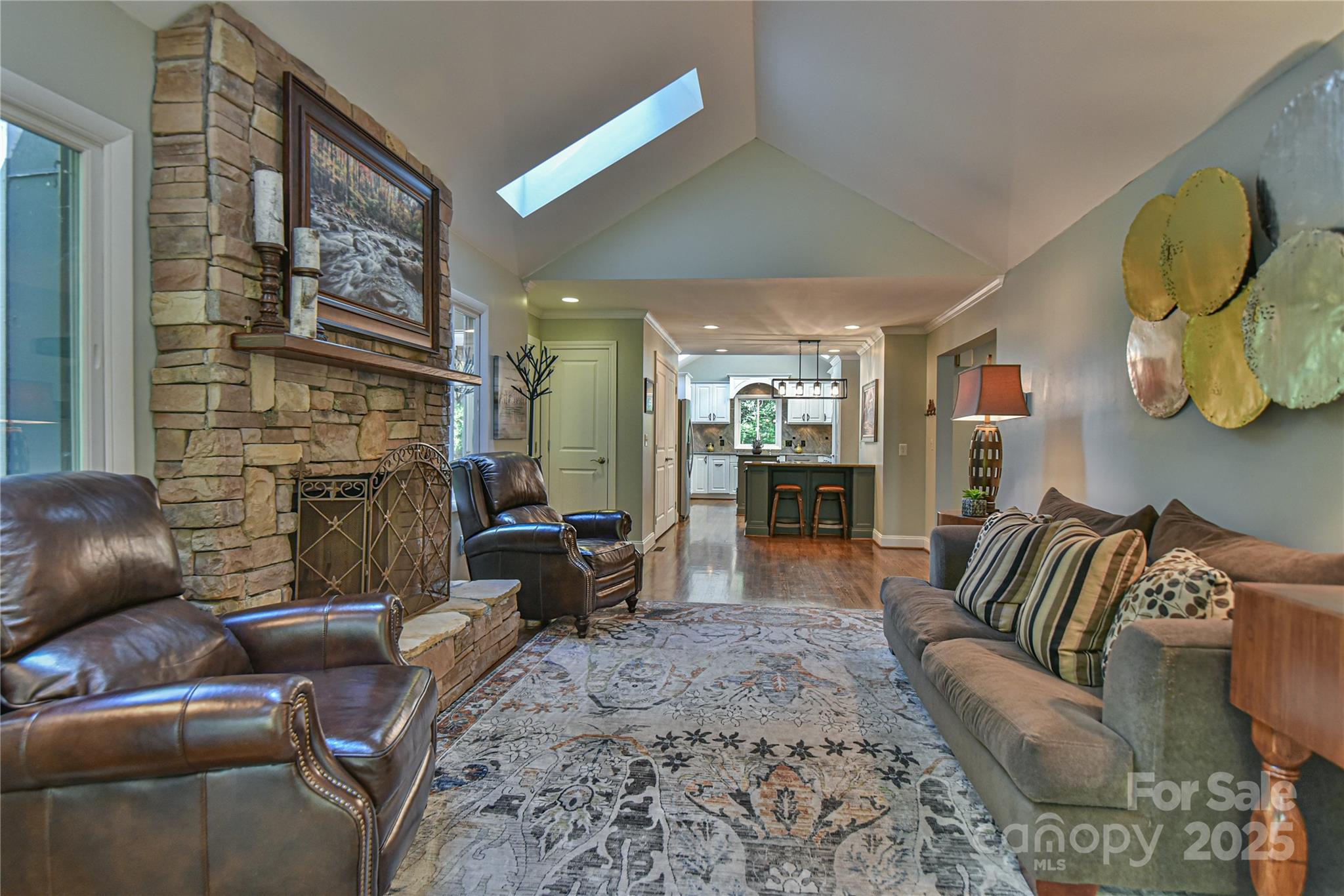 409 North Fork Road Black Mountain, NC 28711 - Photo 10 of 48 a living room with furniture and a fireplace