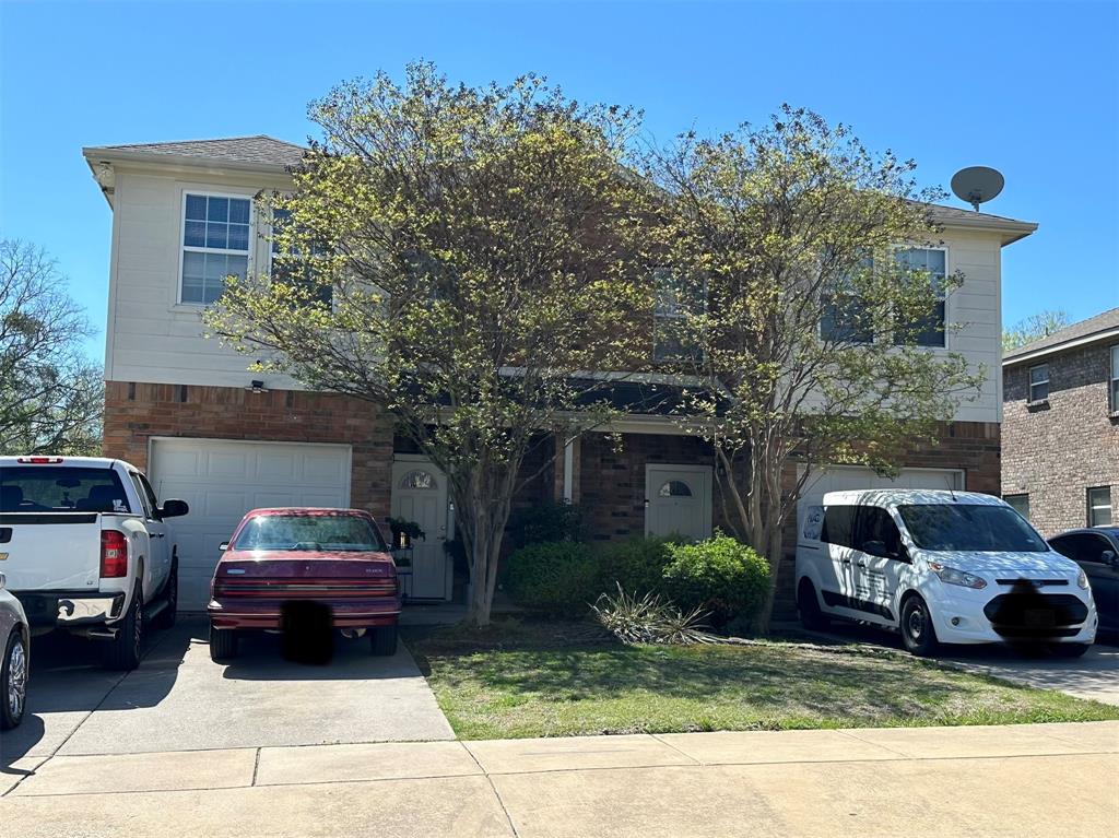 a car parked in front of a house