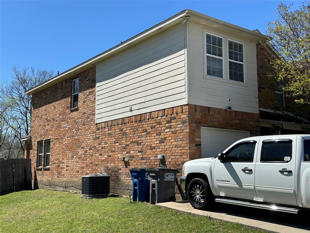 701 Parkplace Ridge Princeton, TX 75407 - Photo 3 of 13 a front view of a house with parking space