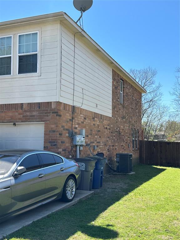 701 Parkplace Ridge Princeton, TX 75407 - Photo 4 of 13 a car parked in front of a house
