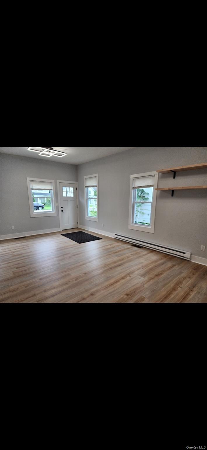 18 Carman Street, Unit 2 Patchogue, NY 11772 - Photo 11 of 11 a view of an ocean from a balcony