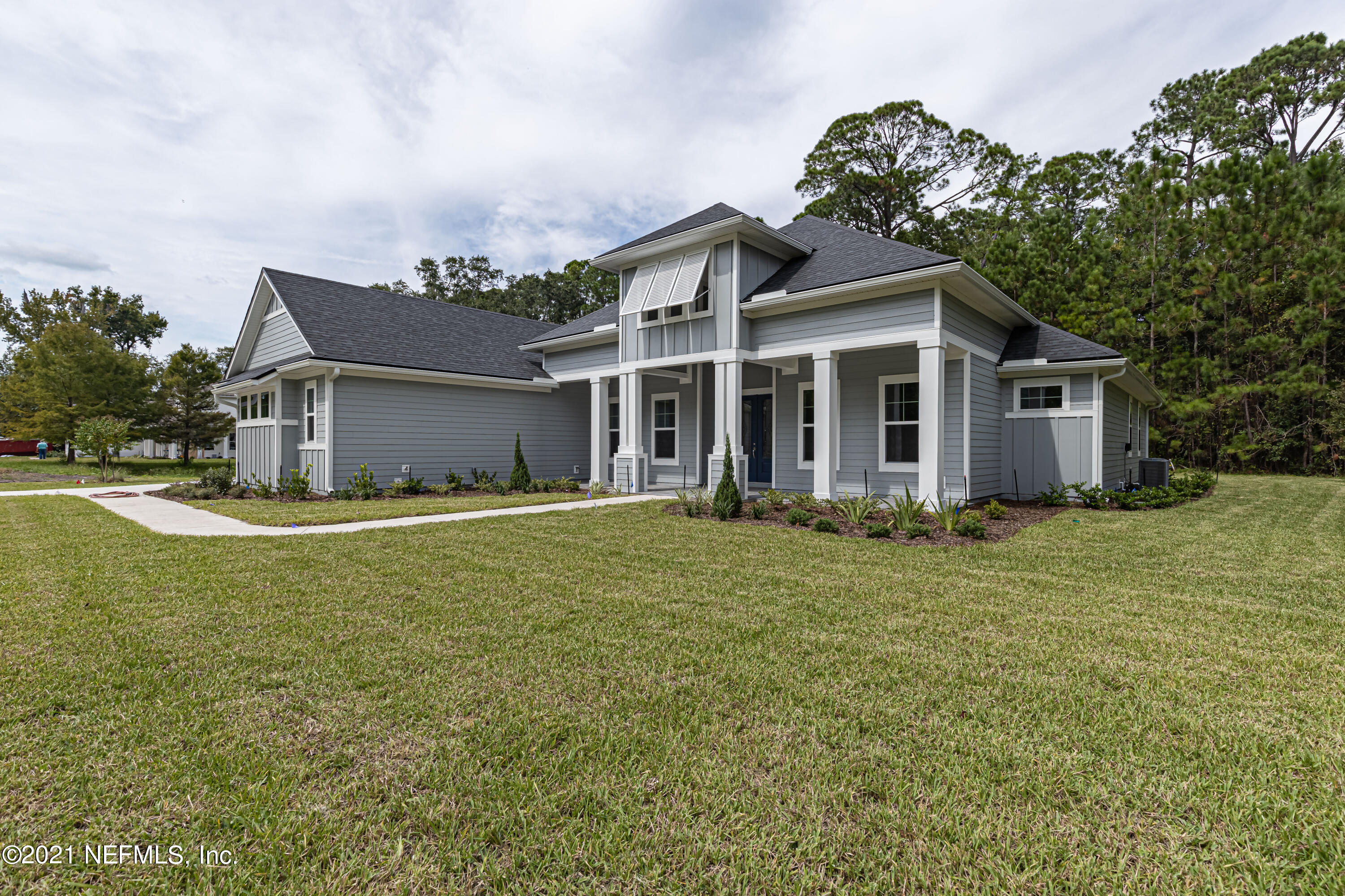 1351 Weaver Glen Road Jacksonville, FL 32223 - Photo 1 of 30 a view of a house with a backyard