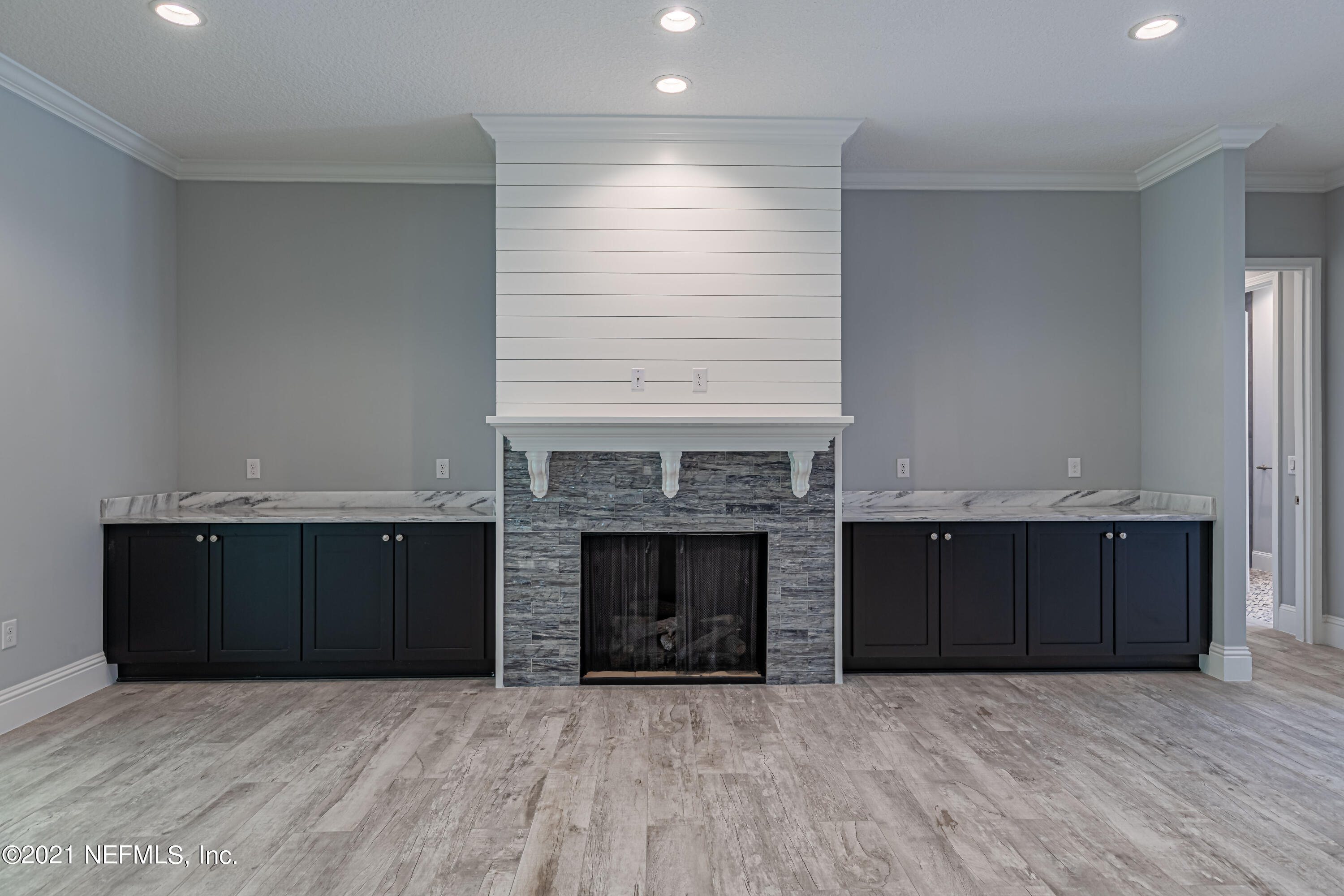 1351 Weaver Glen Road Jacksonville, FL 32223 - Photo 15 of 30 an empty room with kitchen fireplace and kitchen view