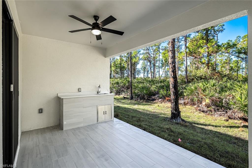 2113 Grayson Avenue Alva, FL 33920 - Photo 21 of 25 View of patio with a ceiling fan and a sink
