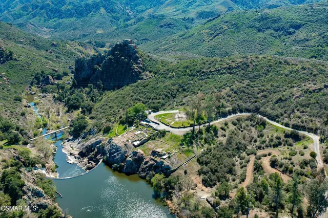 a aerial view of a house with a yard