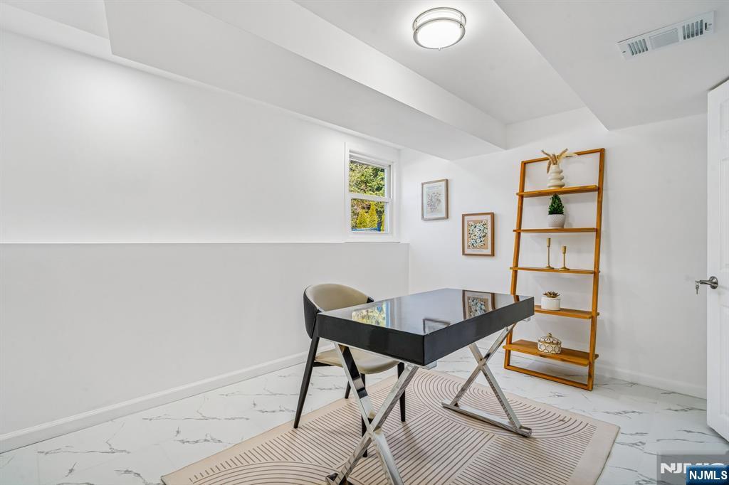 127 Village Circle West Paramus, NJ 07652 - Photo 27 of 46 a view of a workspace with furniture