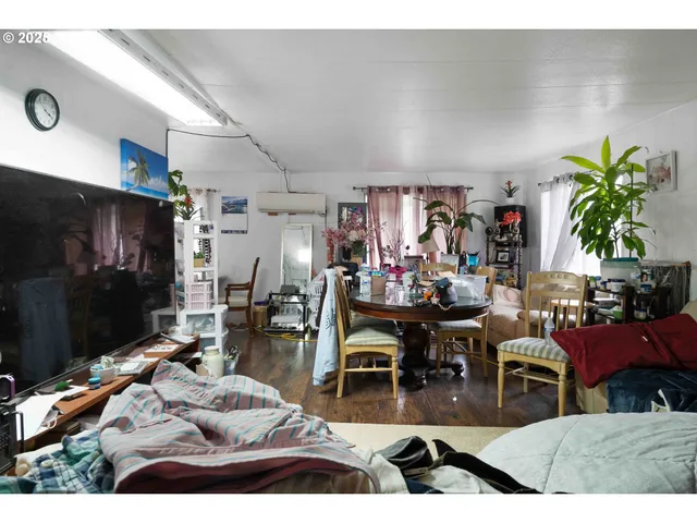 a view of a living room and dining room