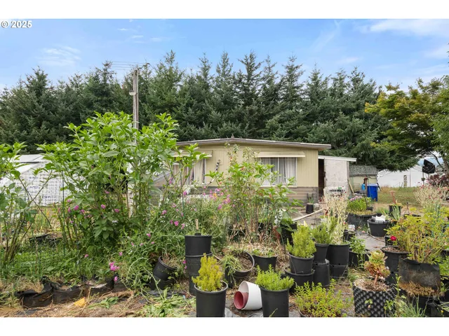 a view of house with outdoor space and seating space