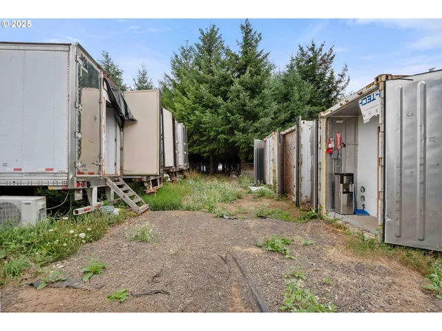 a view of front door and yard
