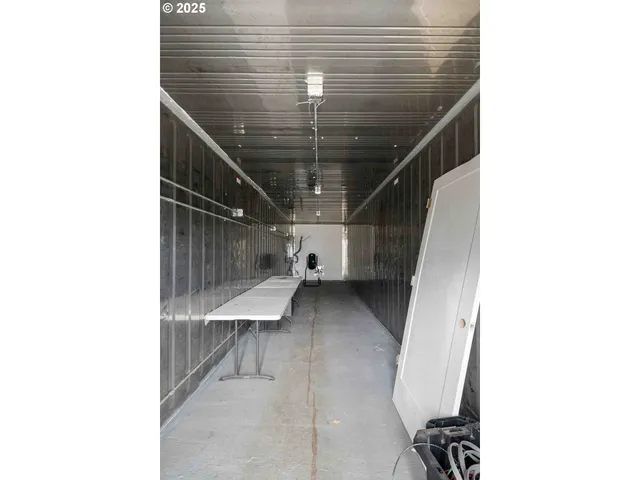 a backyard of a house with a tree