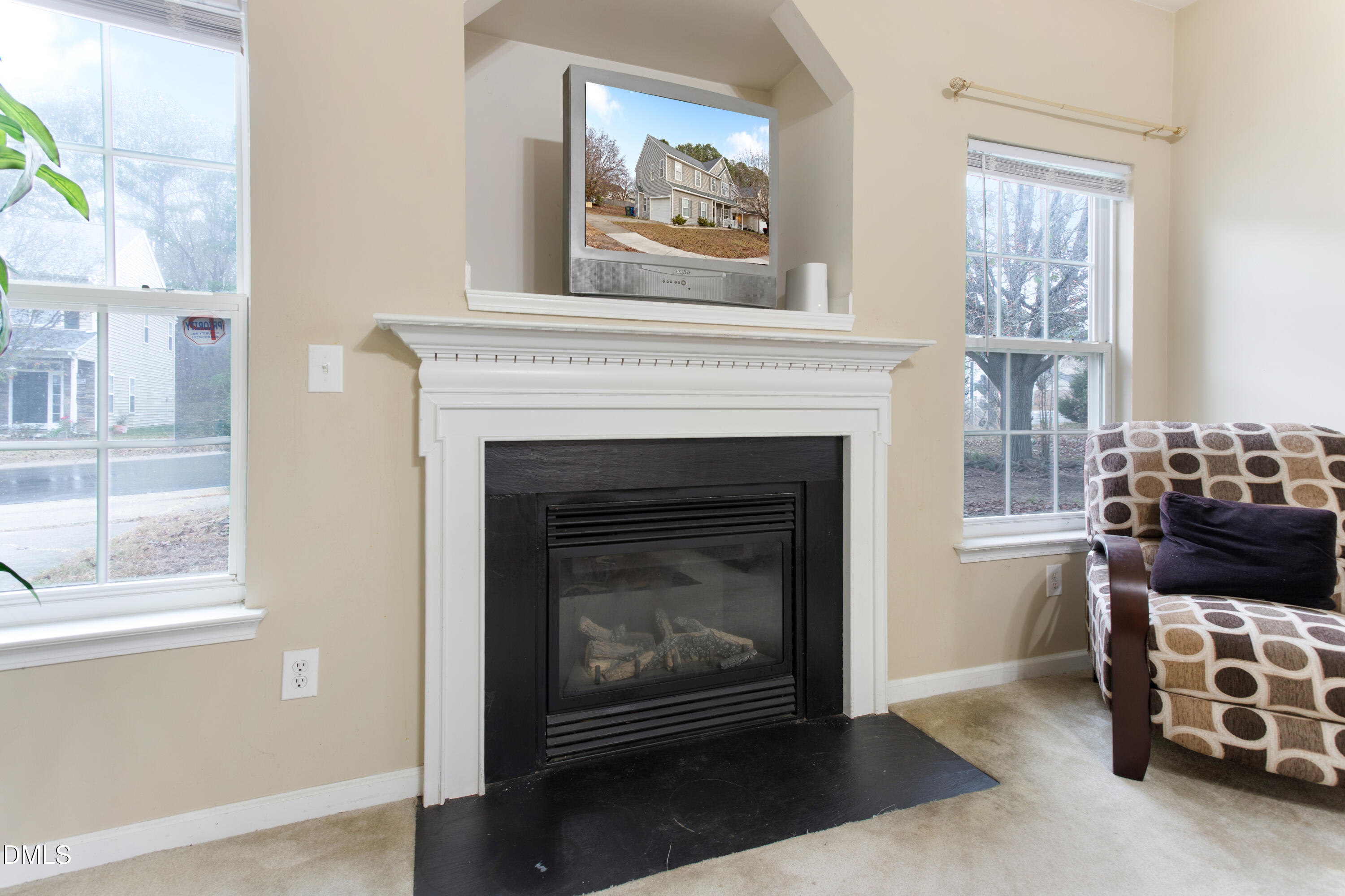 3101 Rendezvous Drive Raleigh, NC 27610 - Photo 15 of 39 a living room with furniture and a fireplace