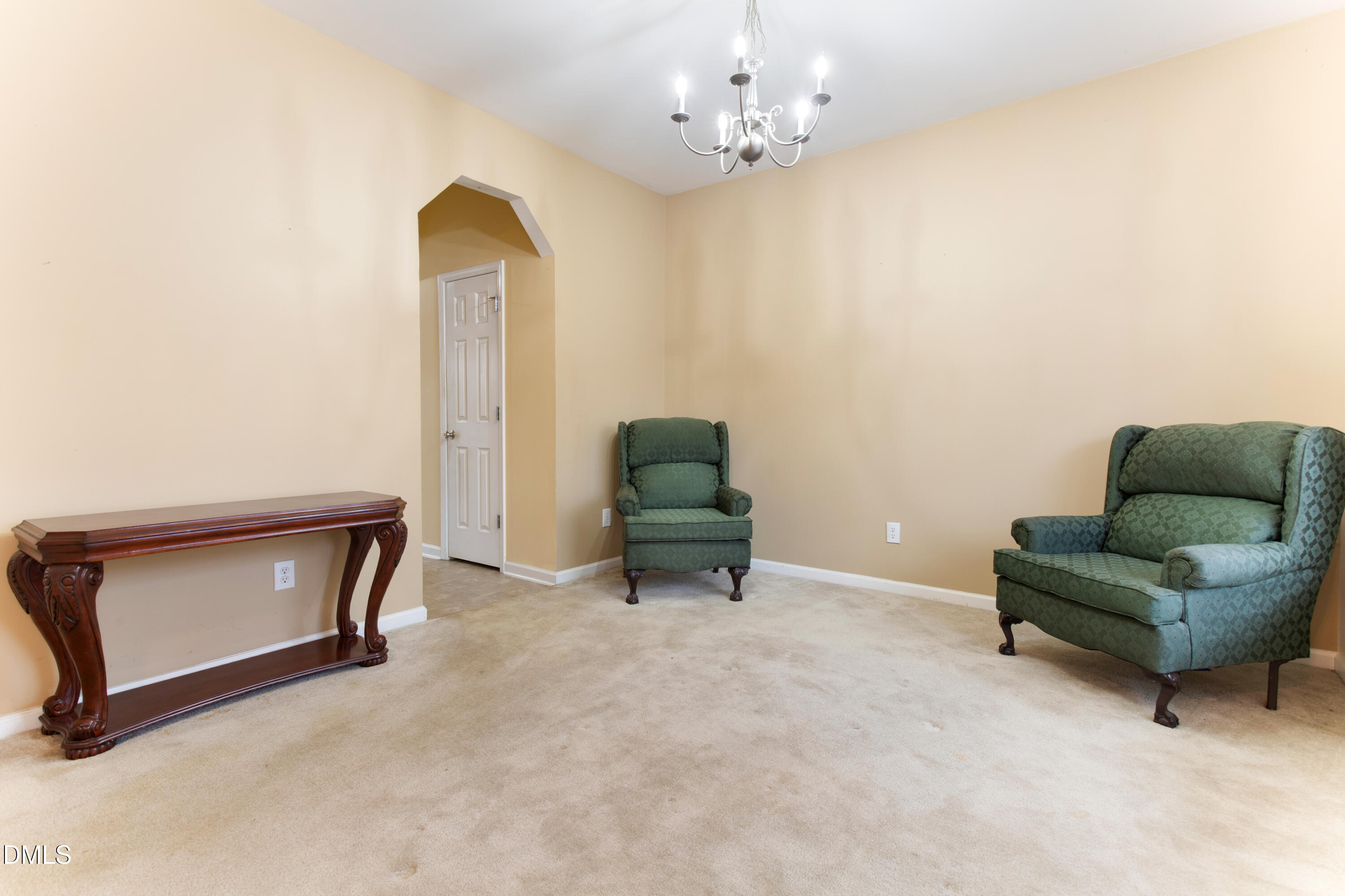 3101 Rendezvous Drive Raleigh, NC 27610 - Photo 16 of 39 a living room with furniture and a window