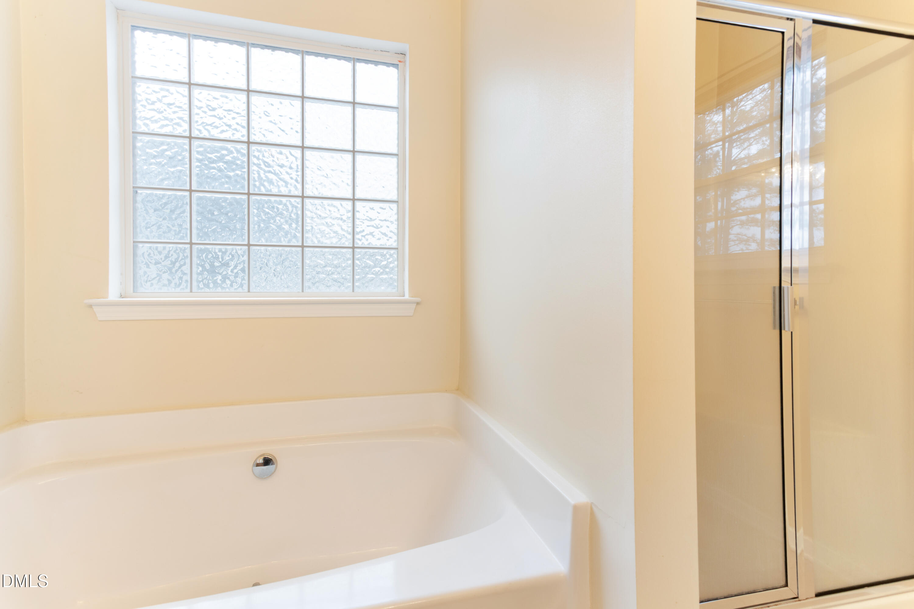 3101 Rendezvous Drive Raleigh, NC 27610 - Photo 32 of 39 a bathroom with a bathtub