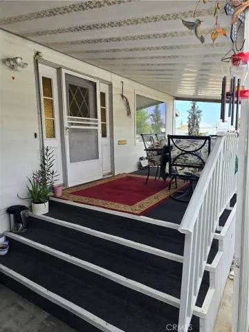 a outdoor space with lots of furniture and plants