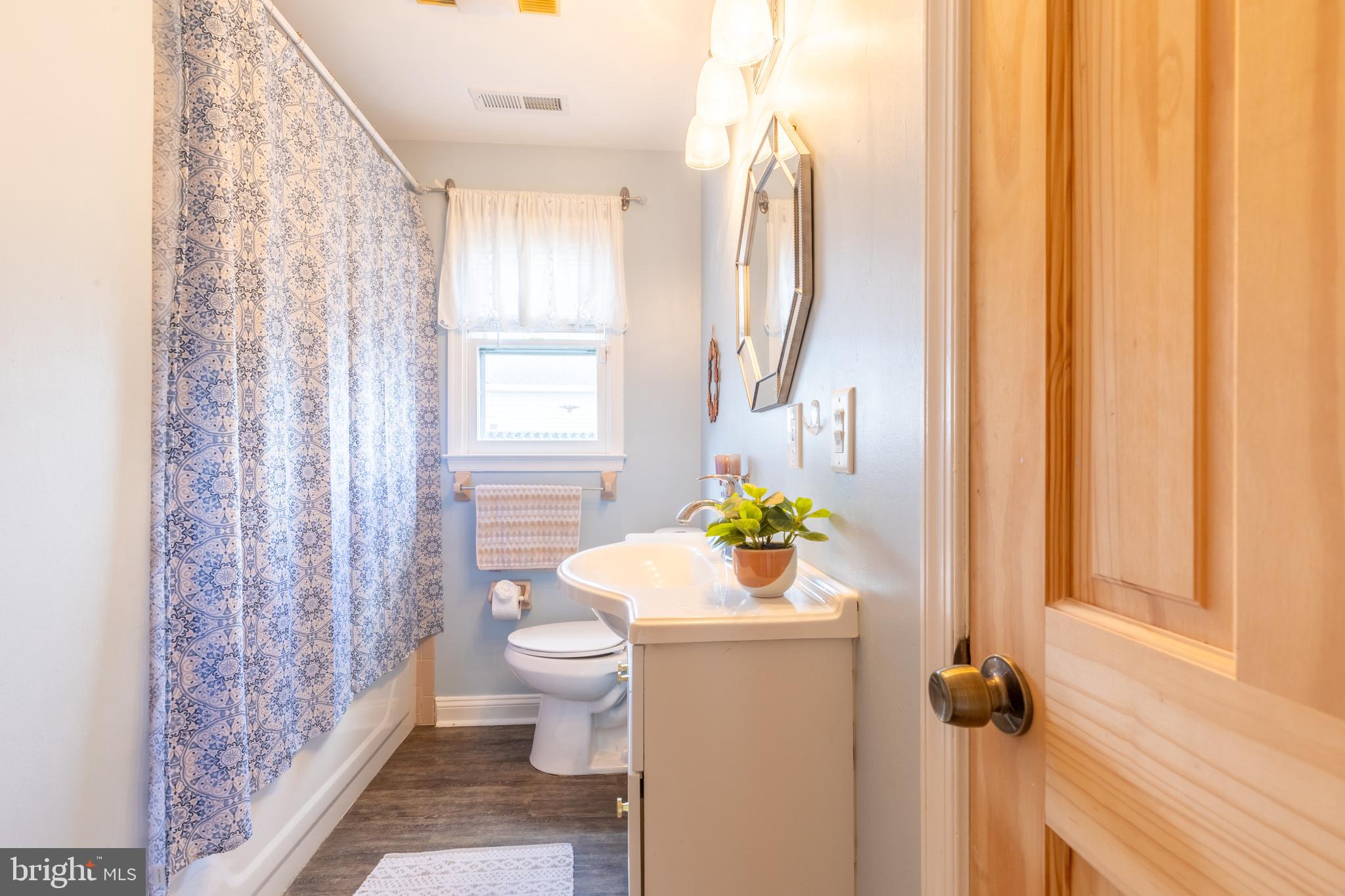 4 Reyburn Court New Castle, DE 19720 - Photo 12 of 21 a bathroom with a sink toilet and shower