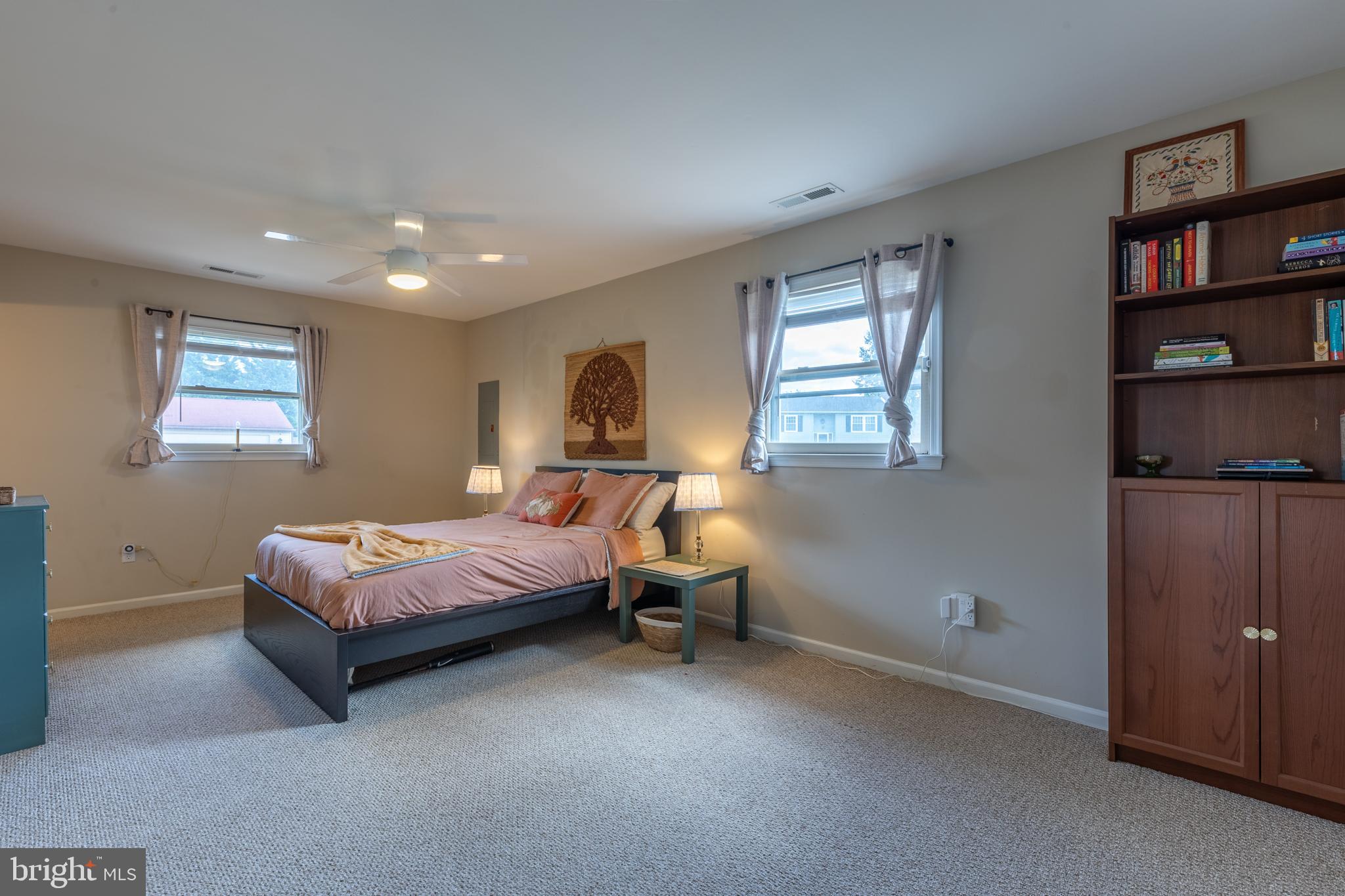 4 Reyburn Court New Castle, DE 19720 - Photo 14 of 21 a spacious bedroom with a bed and a window