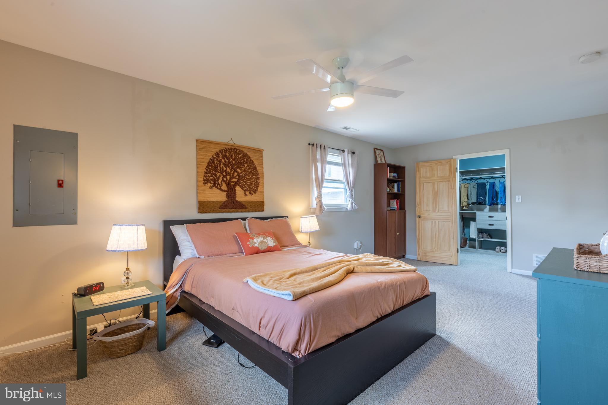 4 Reyburn Court New Castle, DE 19720 - Photo 15 of 21 a bedroom with a large bed and a chandelier