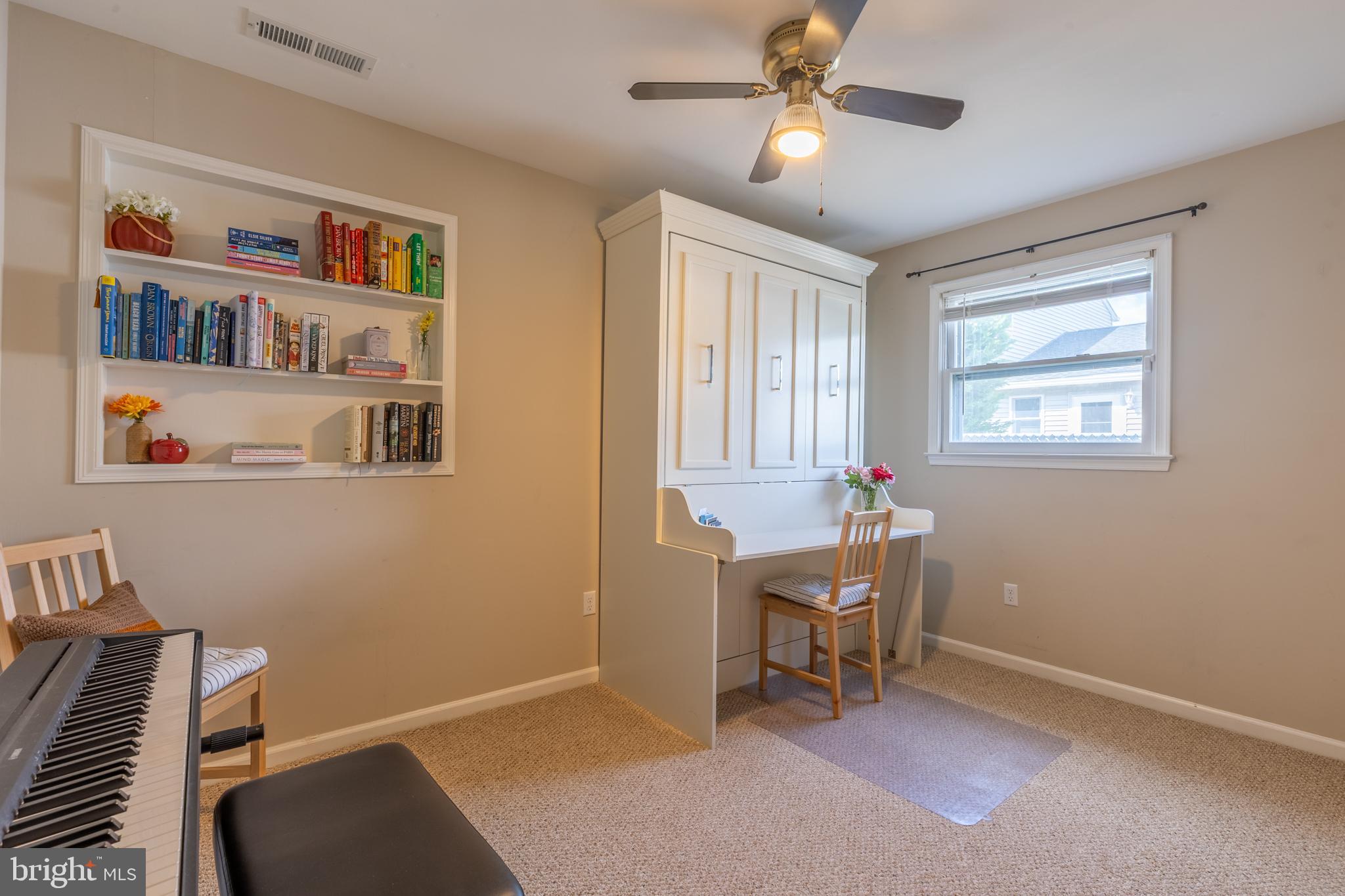 4 Reyburn Court New Castle, DE 19720 - Photo 19 of 21 a room with furniture and a window