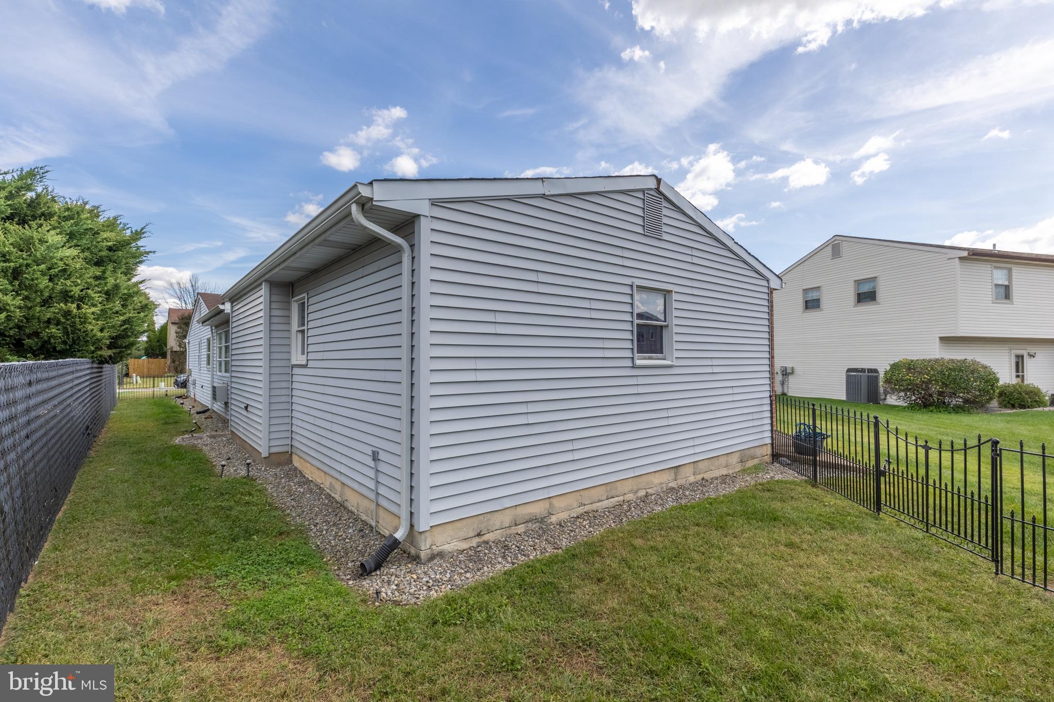 4 Reyburn Court New Castle, DE 19720 - Photo 21 of 21 a view of a house with backyard and fence