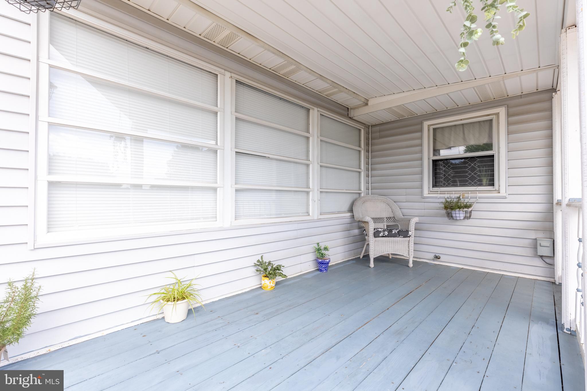 4 Reyburn Court New Castle, DE 19720 - Photo 3 of 21 a living room with wooden floor and furniture