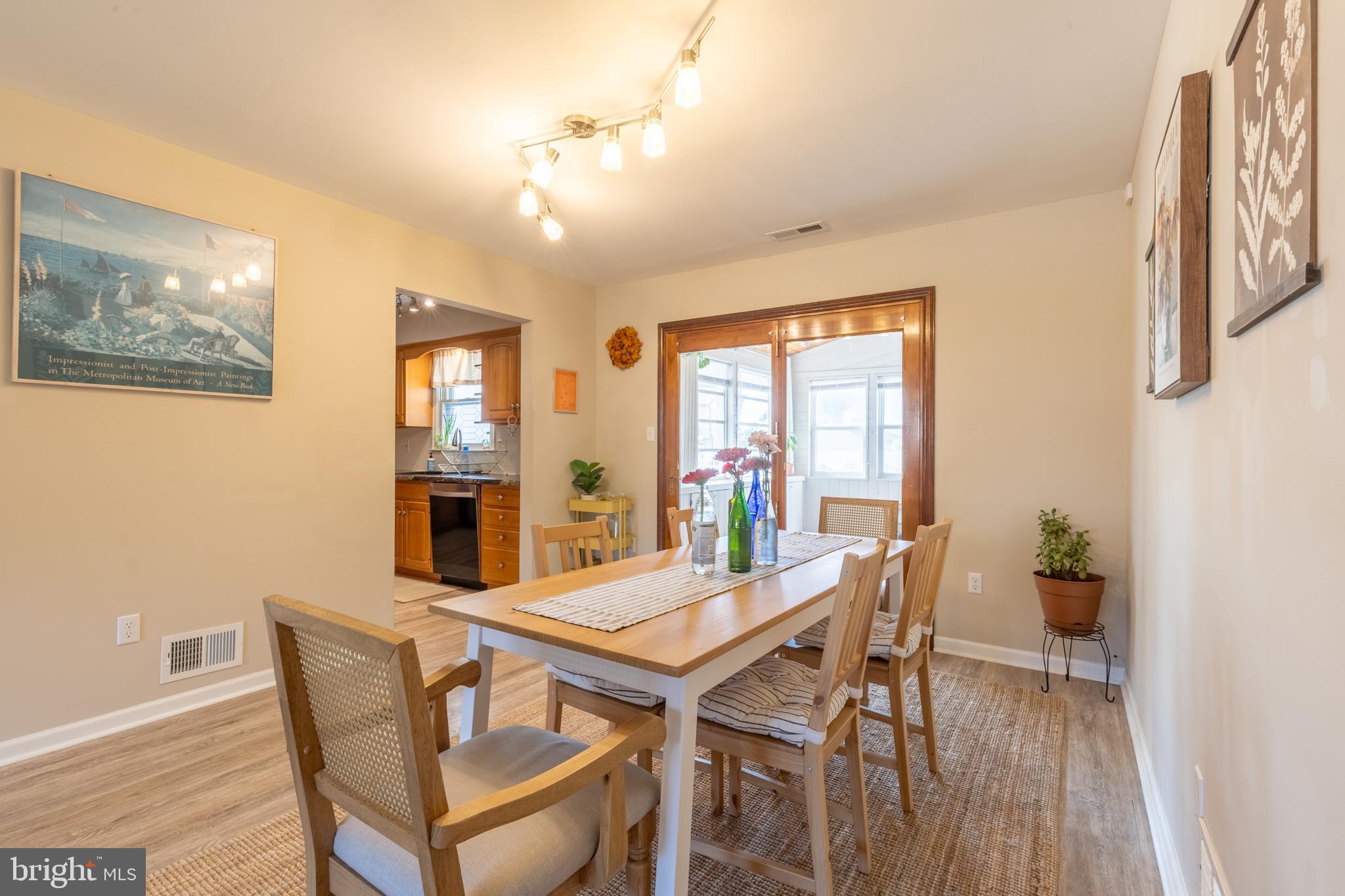 4 Reyburn Court New Castle, DE 19720 - Photo 7 of 21 a view of a dining room with furniture and wooden floor