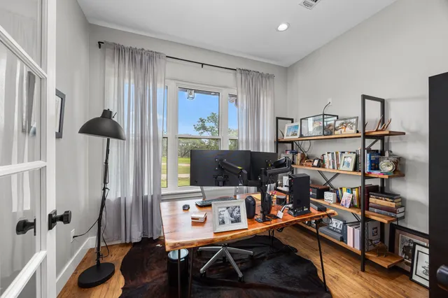 a view of a workspace with furniture and toys