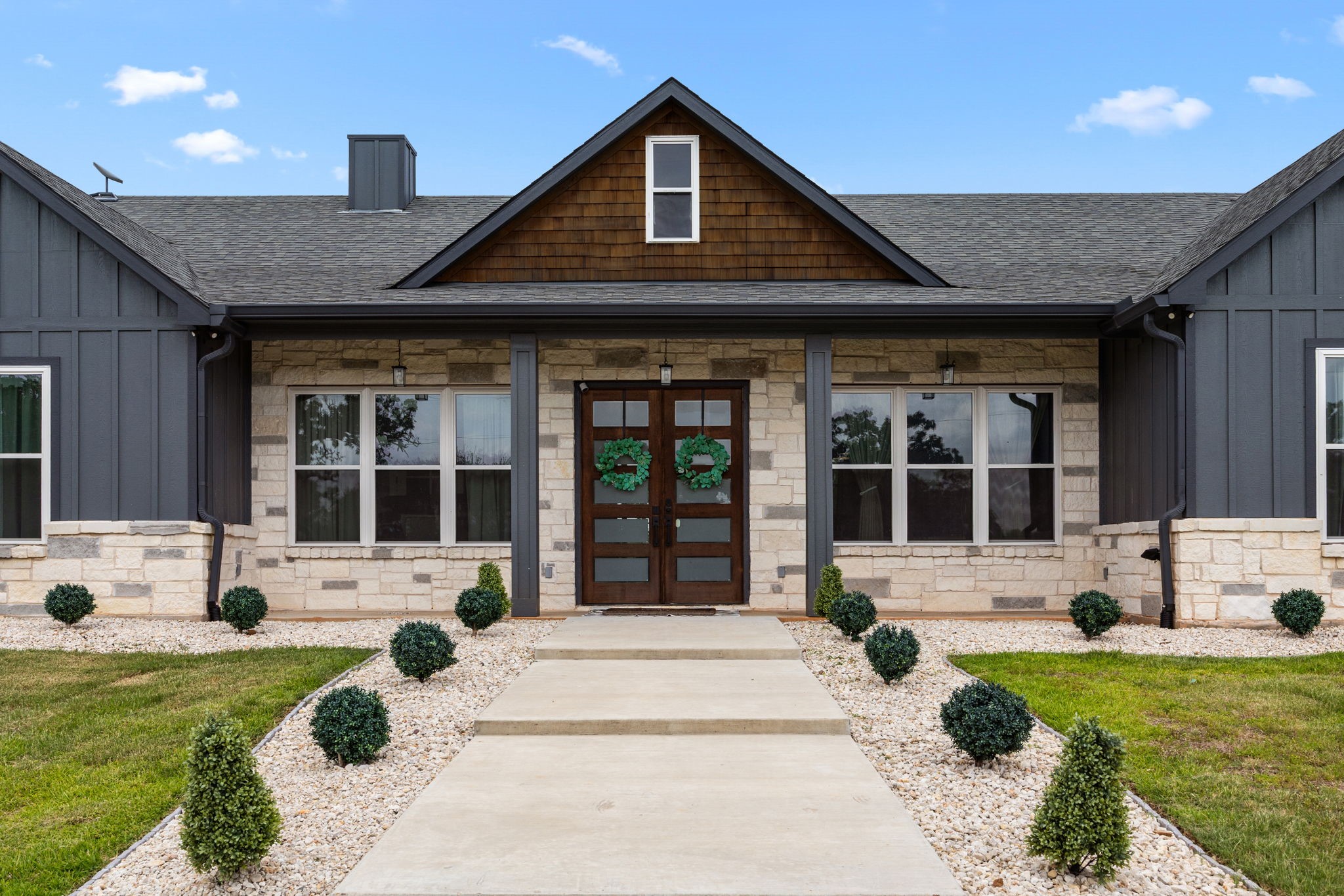 1507 Smith Rau Road Columbus, TX 78934 - Photo 2 of 50 a front view of a house with a yard and seating space