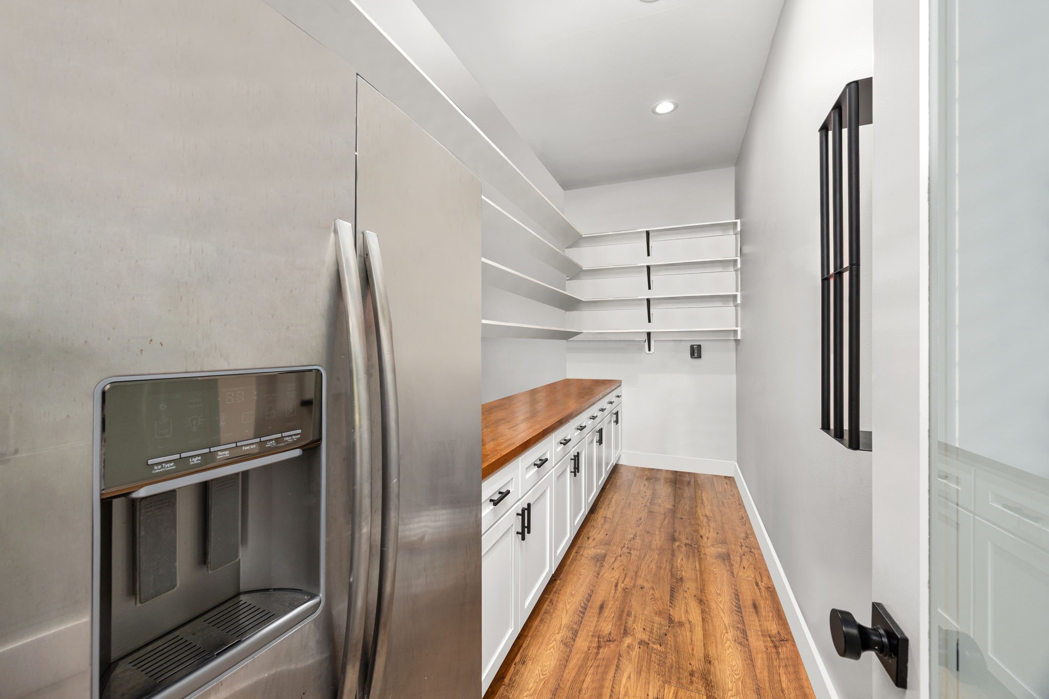 1507 Smith Rau Road Columbus, TX 78934 - Photo 25 of 50 a hallway with cabinets