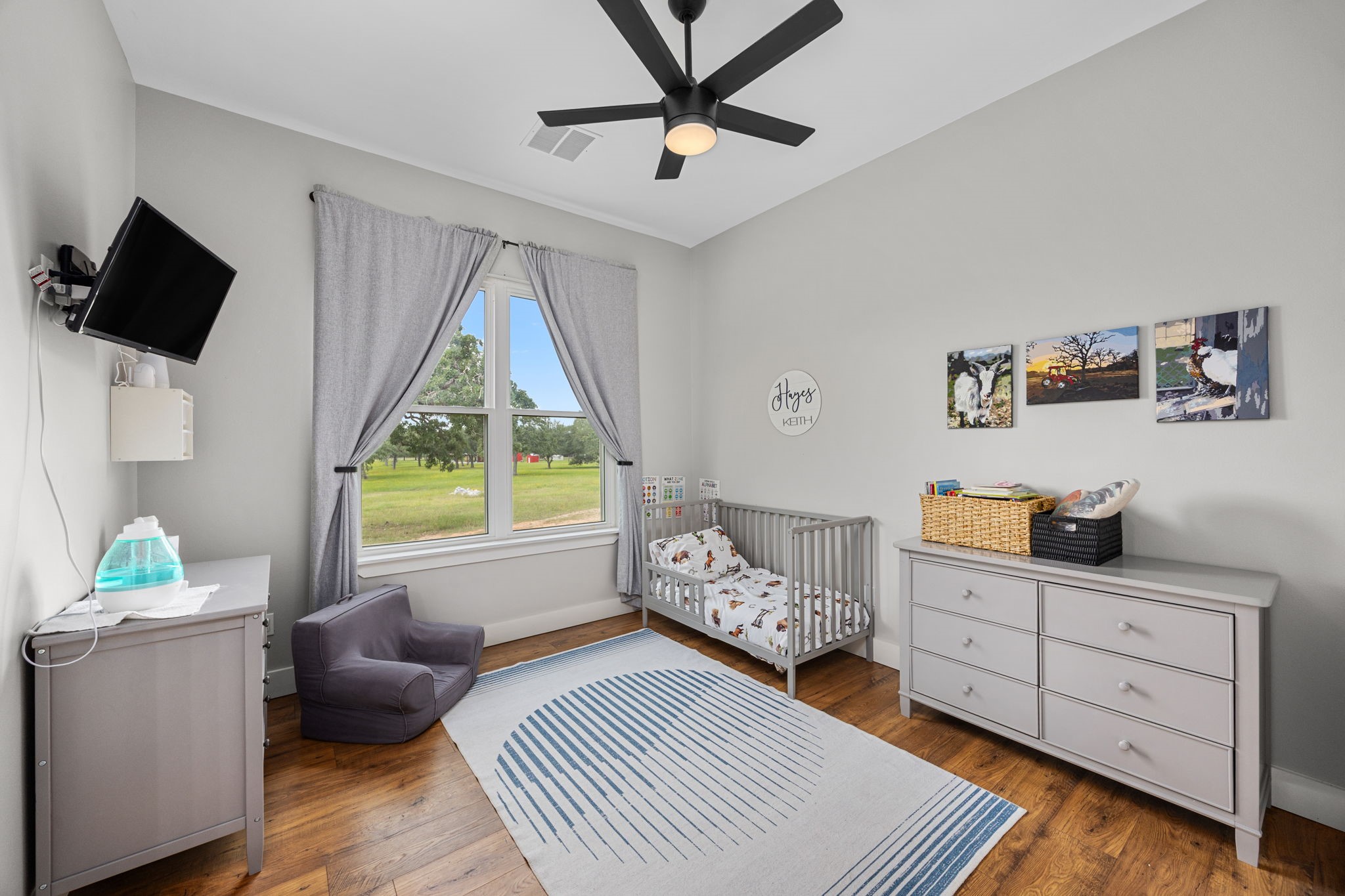 1507 Smith Rau Road Columbus, TX 78934 - Photo 28 of 50 a bedroom with furniture and a window