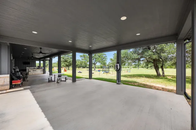 a very nice looking room with a large window and sitting area