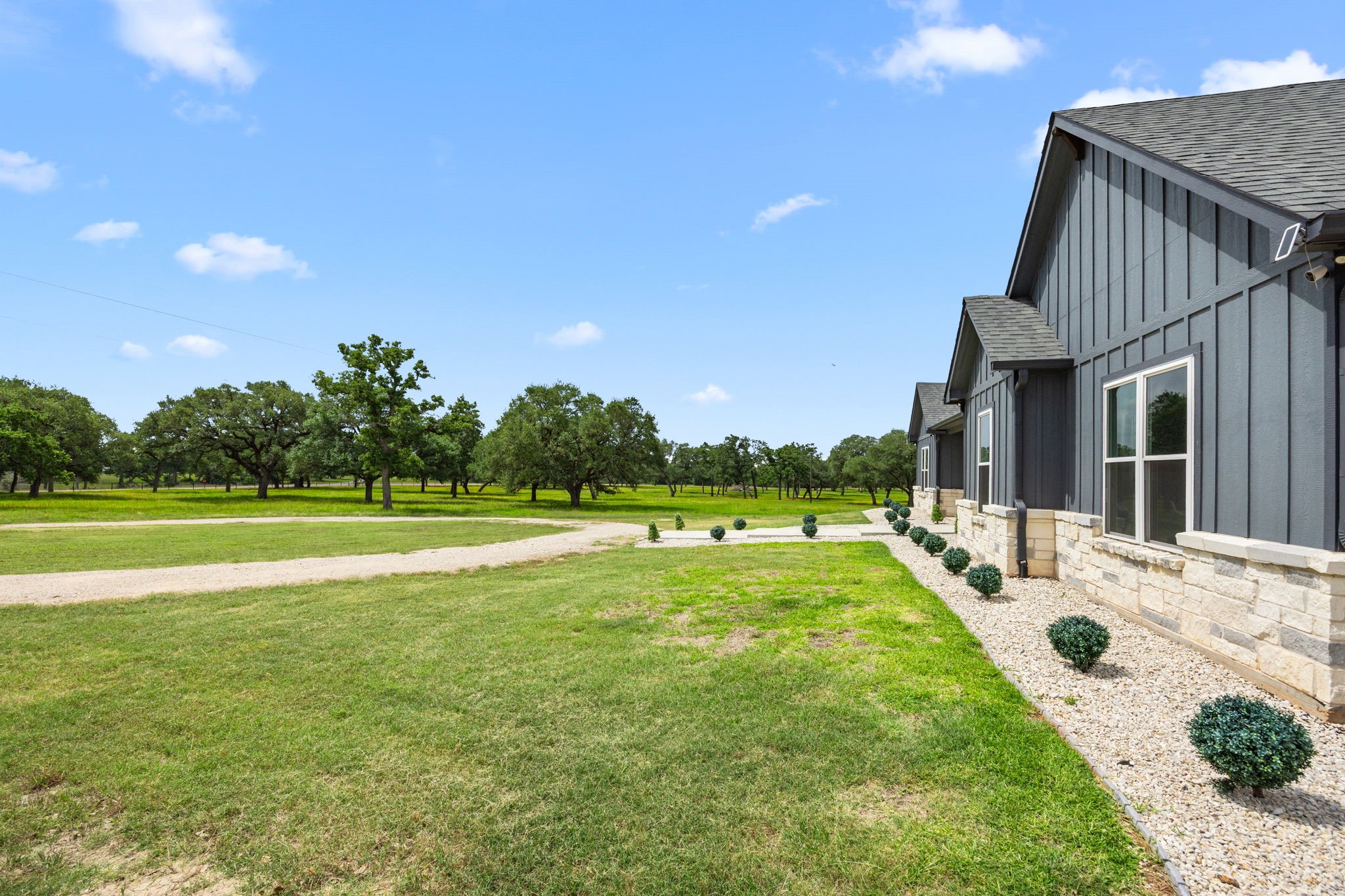 1507 Smith Rau Road Columbus, TX 78934 - Photo 40 of 50 a view of backyard with swimming pool and outdoor seating