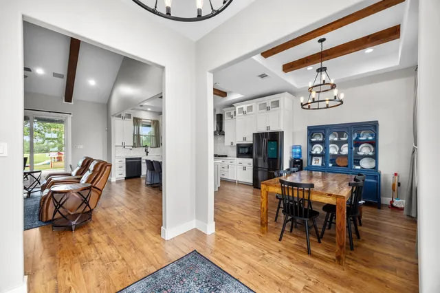 a view of a dining room with furniture