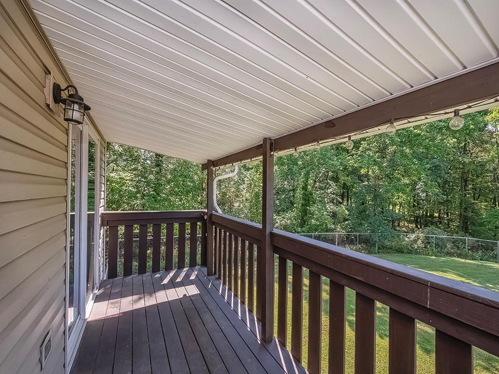516 South Eberhart Road Butler, PA 16001 - Photo 14 of 31 a view of a balcony with wooden floor