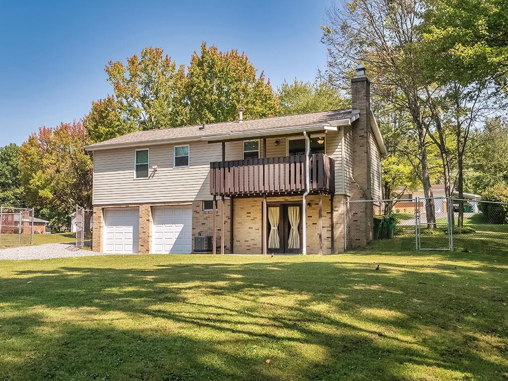 516 South Eberhart Road Butler, PA 16001 - Photo 2 of 31 a front view of a house with a yard