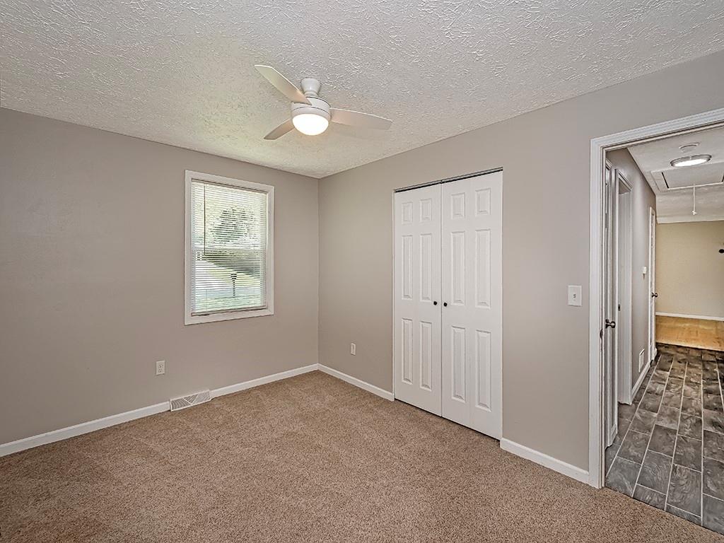 516 South Eberhart Road Butler, PA 16001 - Photo 22 of 31 a view of an empty room with window and closet area