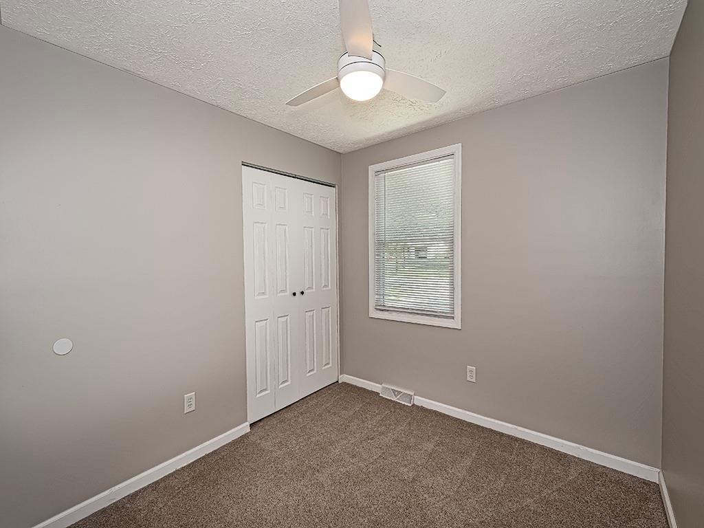 516 South Eberhart Road Butler, PA 16001 - Photo 23 of 31 an empty room with windows and fan