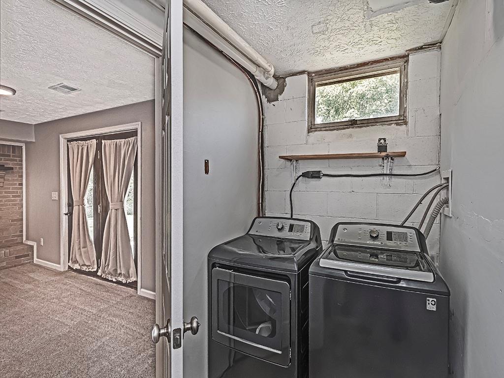 516 South Eberhart Road Butler, PA 16001 - Photo 31 of 31 a utility room with dryer and washer