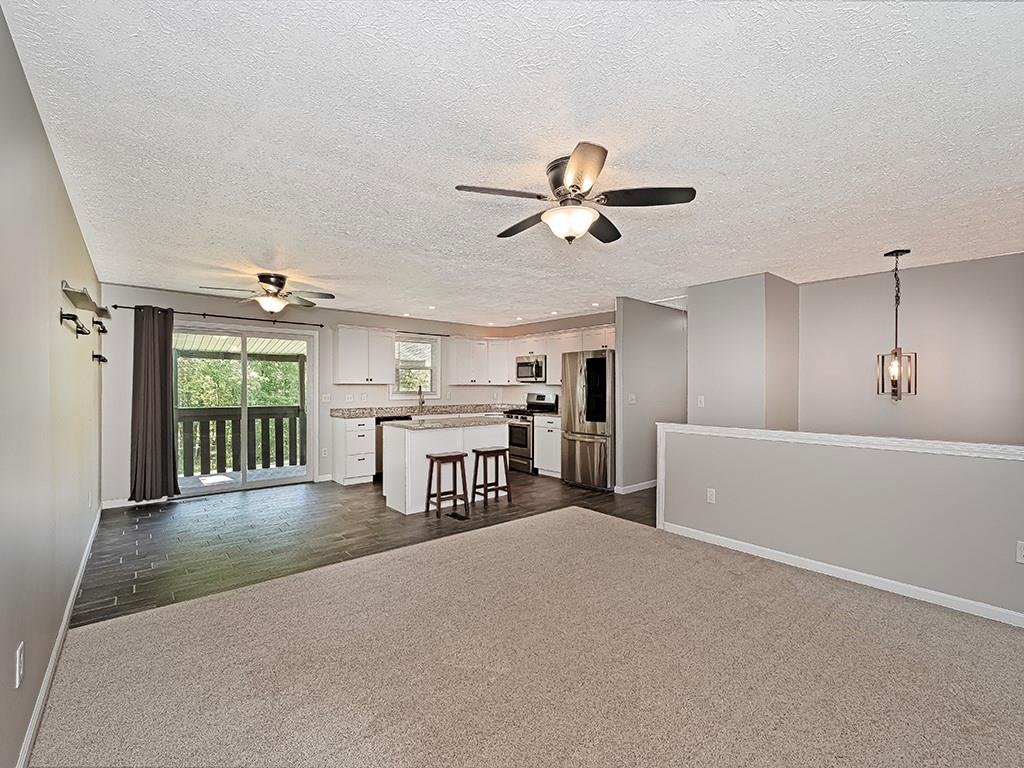 516 South Eberhart Road Butler, PA 16001 - Photo 7 of 31 a view of a livingroom with a flat screen tv