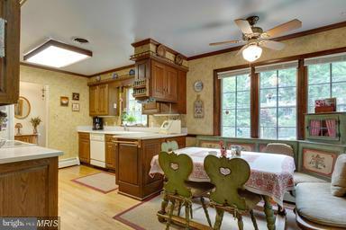 6609 Robin Road Springfield, VA 22150 - Photo 11 of 28 a view of a dining room with furniture window and outside view