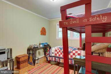 6609 Robin Road Springfield, VA 22150 - Photo 12 of 28 a view of a room with furniture and toys